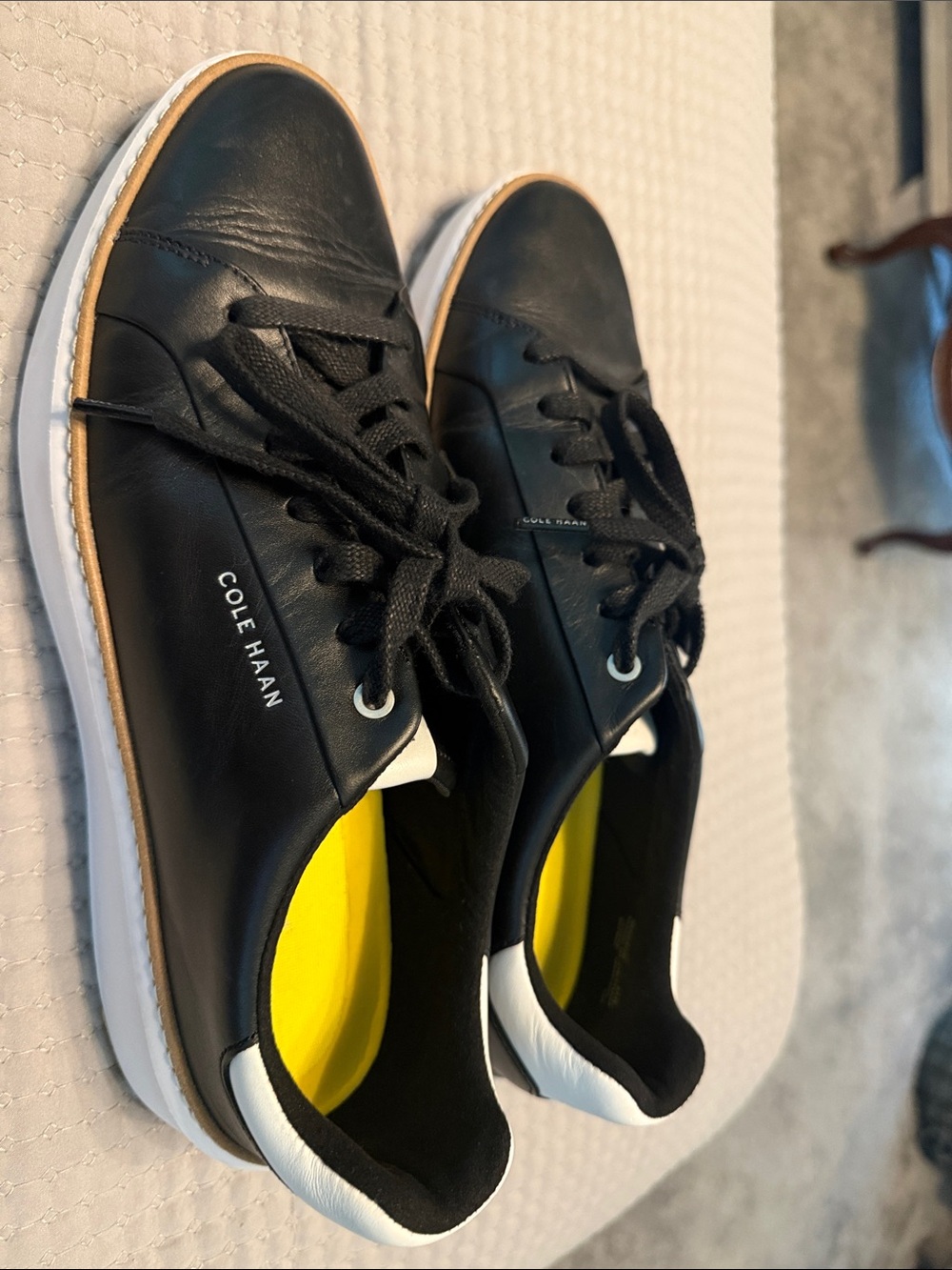 Cole Haan Black Leather Low-Top Sneakers with White Trim and Yellow Insoles